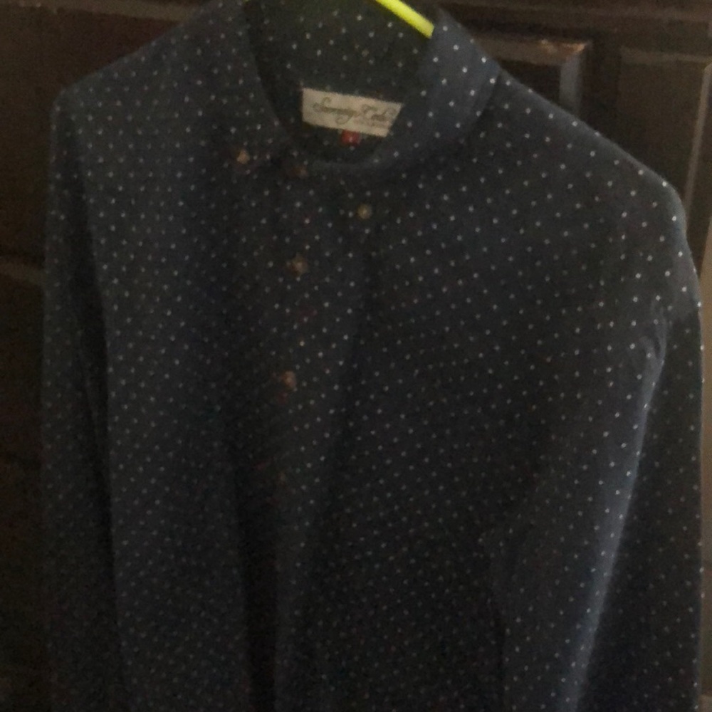 Navy blue button-down shirt with white dots